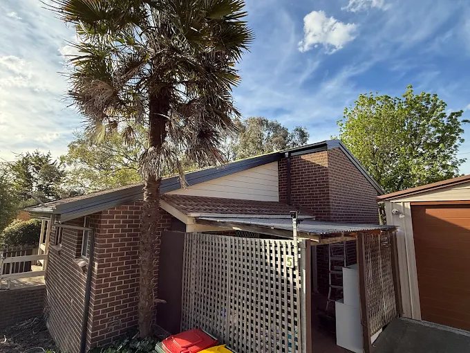 Limitless Roof Solutions fascia and awning roof work on a brick home